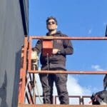 Jossie Pops on a cherry picker